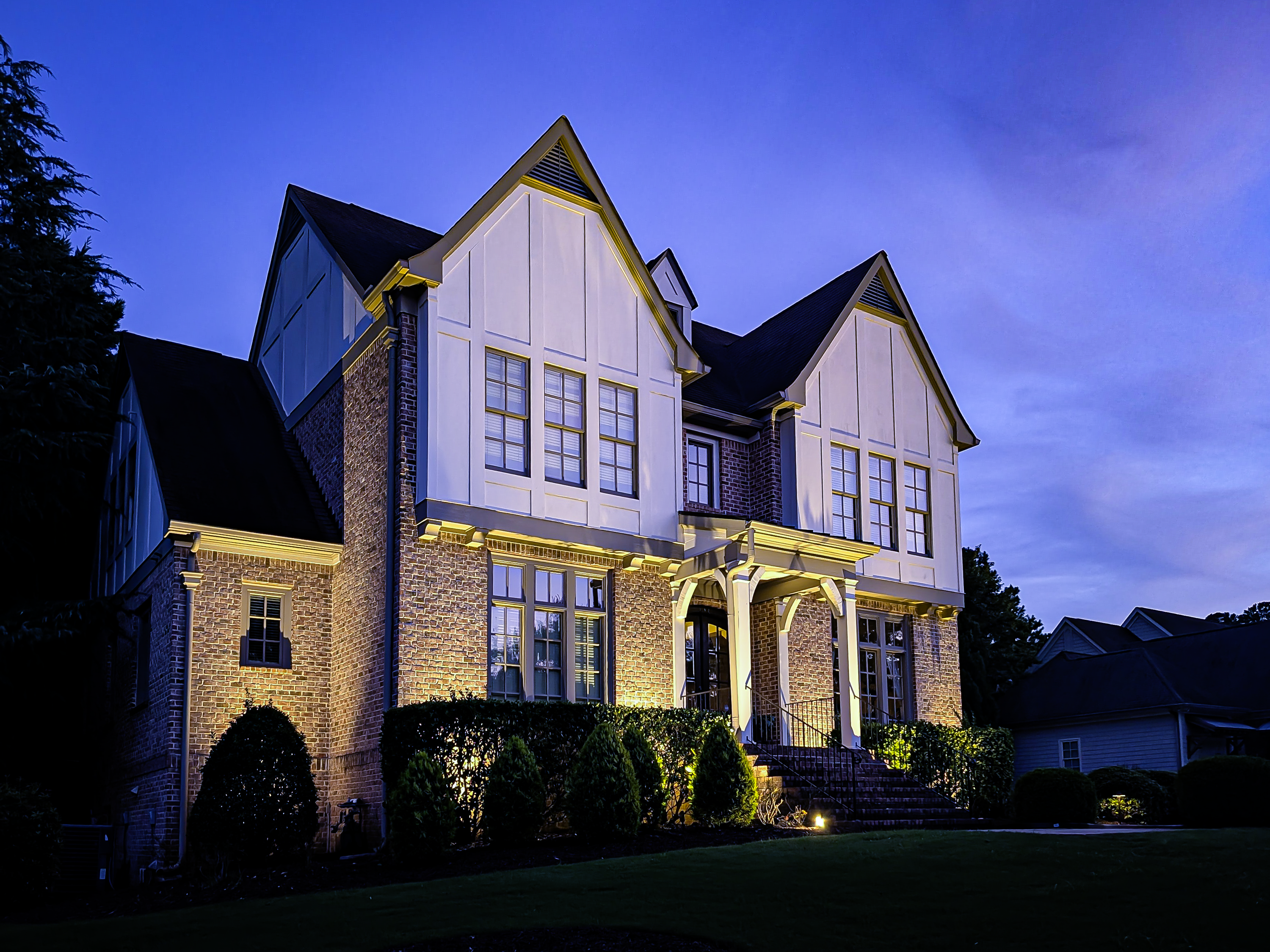 Newhaven property, finished landscape lighting at dusk