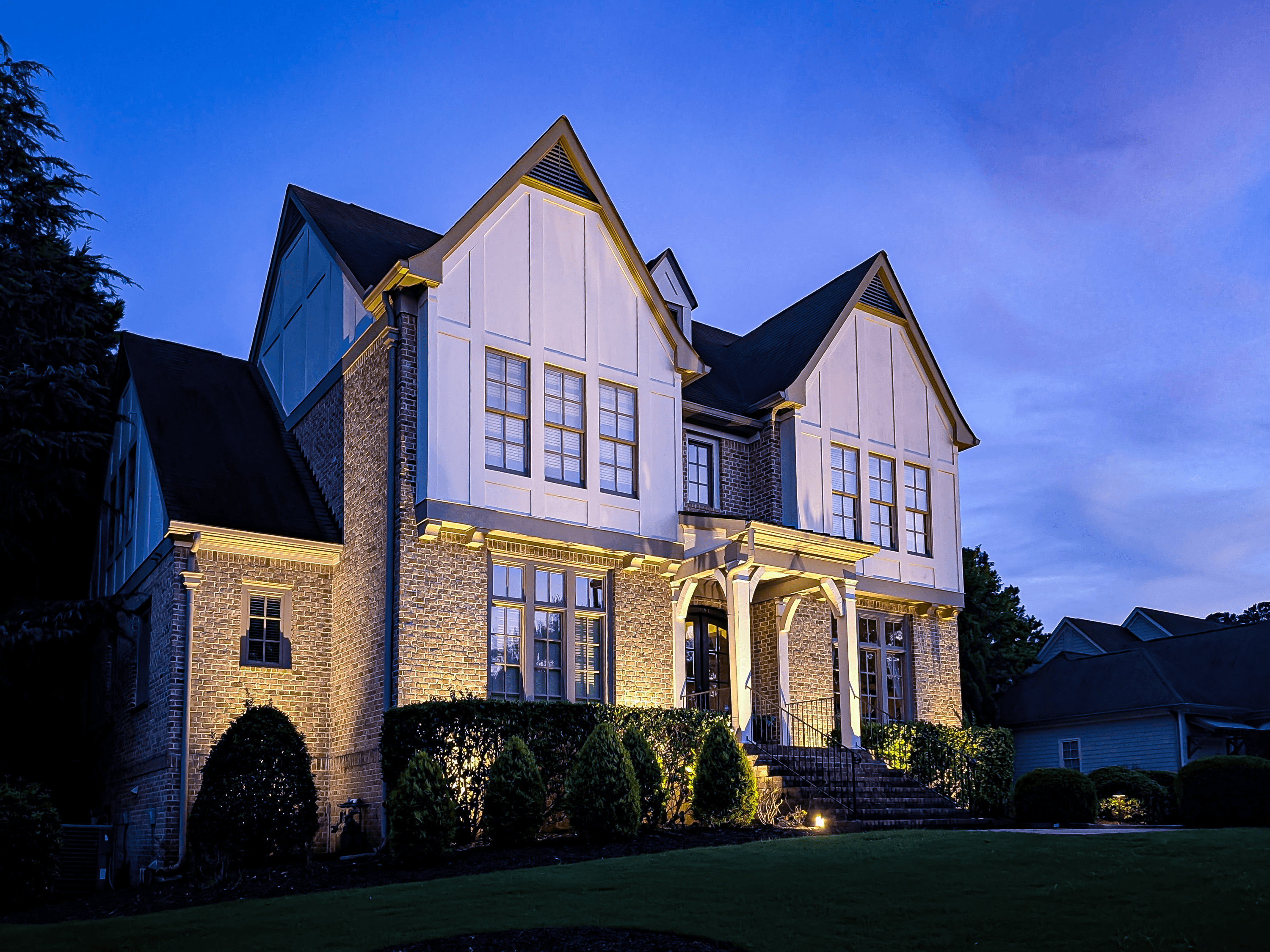 Newhaven property, finished landscape lighting at dusk