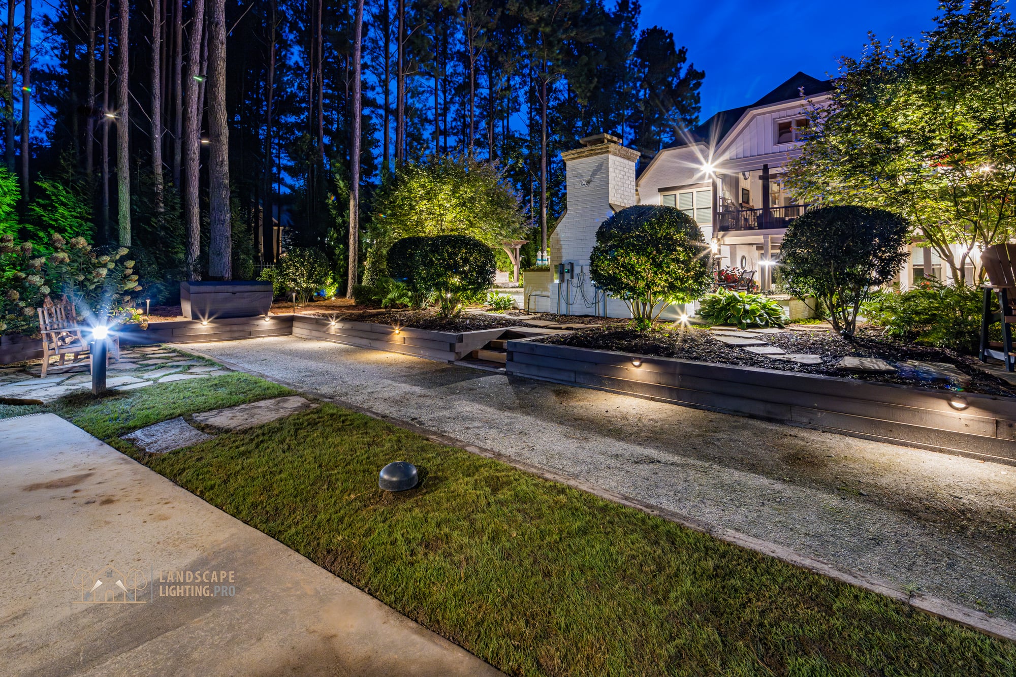 A planted bed and lawn approach on the Newhaven property at dusk